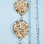 Flower Engraved Oval Concho Chain Belt