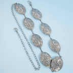 Flower Engraved Oval Concho Chain Belt